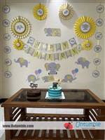 Kothai  : We loved the name cake topper from untumble ?? and also the elephant theme decors are great 