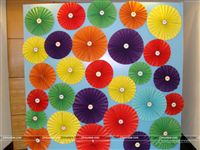 A photo booth scene setter with all the colours of the rainbow for bright selfies and group photos. 