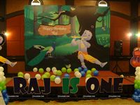 Stage decor with the baby name alphabets setup at the front of the stage